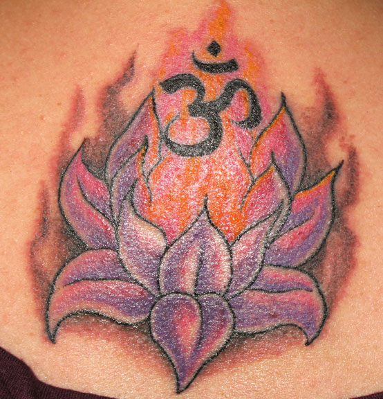 So this is my new tattoo. My first. Lotus Tattoo with Om Symbol